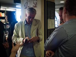 Kelly McErlean signs a copy of IN&TS.